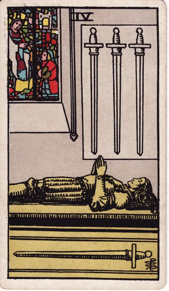Four of Swords: The effigy of a knight in the attitude of prayer, at full length upon his tomb.
