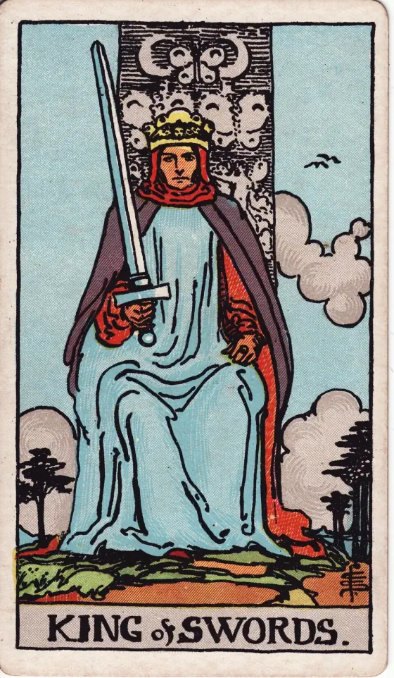King of Swords: He sits in judgment, holding the unsheathed sign of his suit.