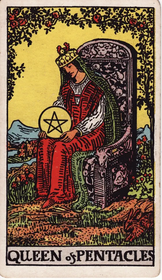Queen of Pentacles: A crowned queen sits on a carved stone throne in a garden under an arch of roses, looking down at the pentacle in her lap; a rabbit crouches in the corner.