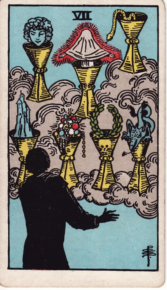 Seven of Cups: A figure in silhouette faces seven cups floating in clouds, each holding a vision: a head, a veiled glowing figure, a snake, a castle, jewels, a laurel wreath and a dragon.