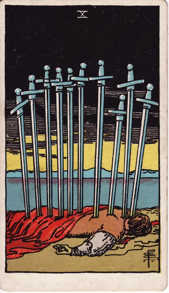 Ten of Swords: A prostrate figure, pierced by all the swords belonging to the card.