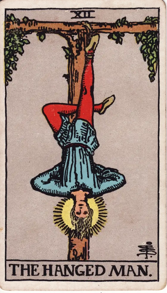 The Hanged Man: The gallows from which he is suspended forms a Tau cross, while the figure—from the position of the legs—forms a fylfot cross.