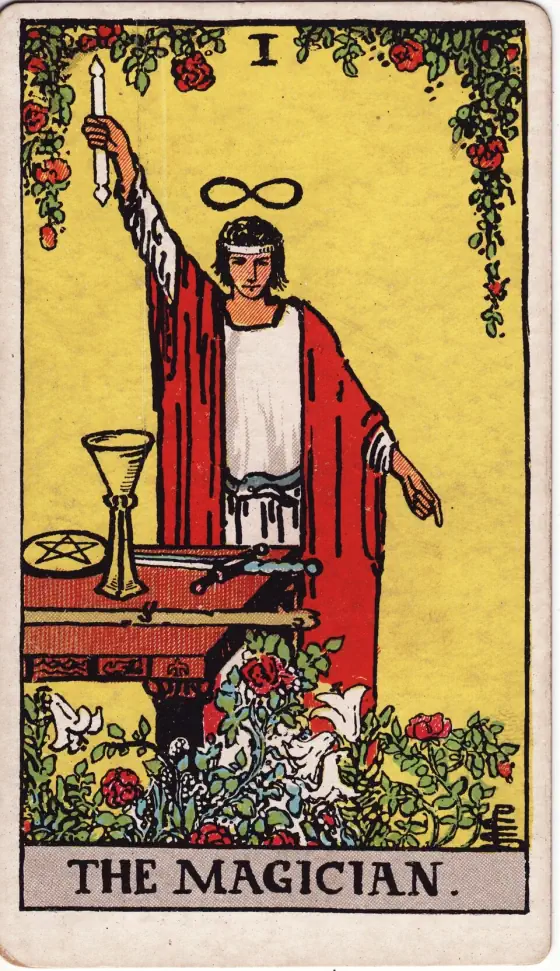 The Magician: A youthful figure in the robe of a magician, having the countenance of divine Apollo, with smile of confidence and shining eyes.